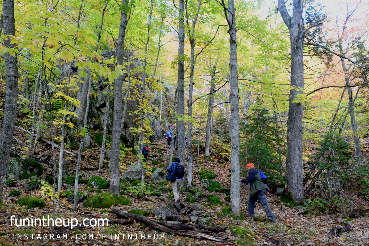 Climbing up the side of the cliffs to the upper trail