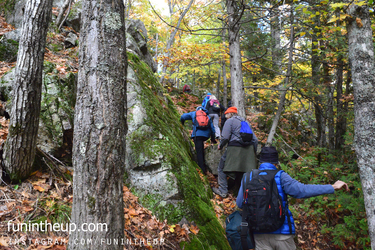Climbing up the side of the cliffs to the upper trail