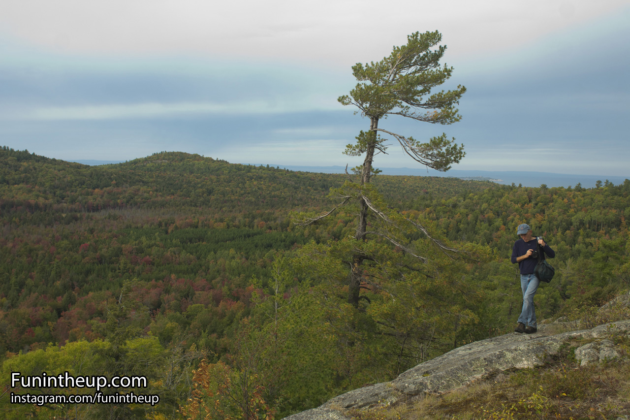Keith on west of bald spot on Ghost Peak with Lake Superior views.